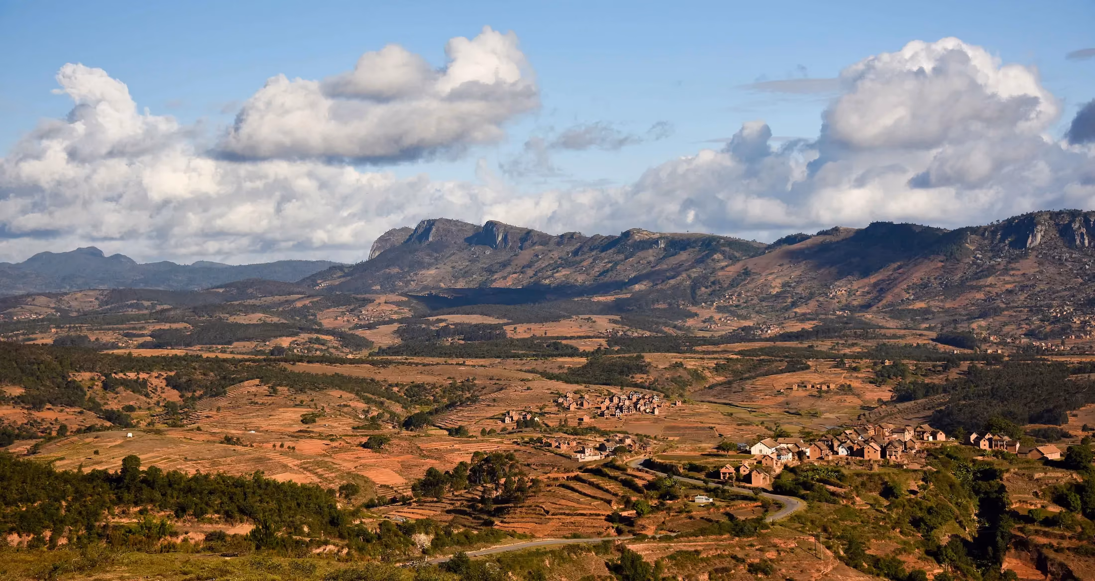 Landscape of the Malagasy highlands under a wide sky